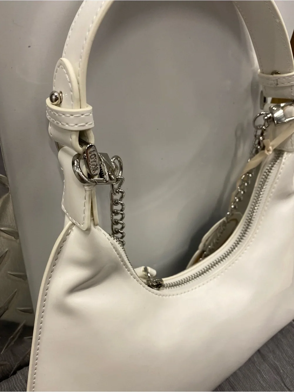 Elegant White Patent Hobo Bag with Chain Accent
